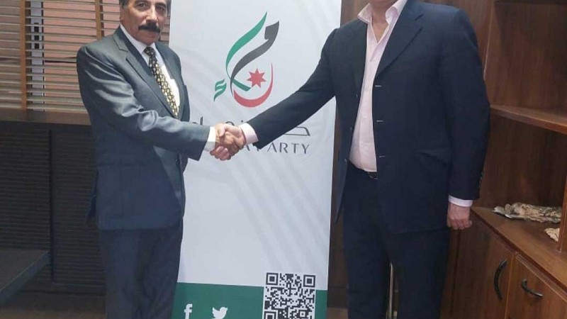  نماء  و الأنصار الأردني  يوقعان محضر دمج تمهيداً لتوحيد الحزبين- (صور)